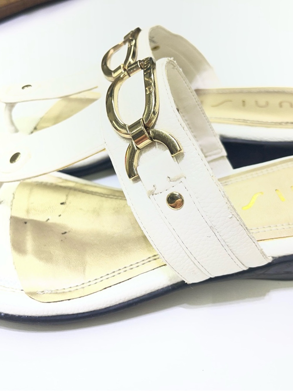 Unisa brand white mules featuring a gold-tone metal detail. - Picture 2 of 6